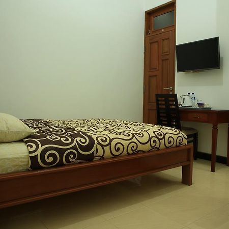 Puri Kusuma Pensión Selemadeg Habitación foto